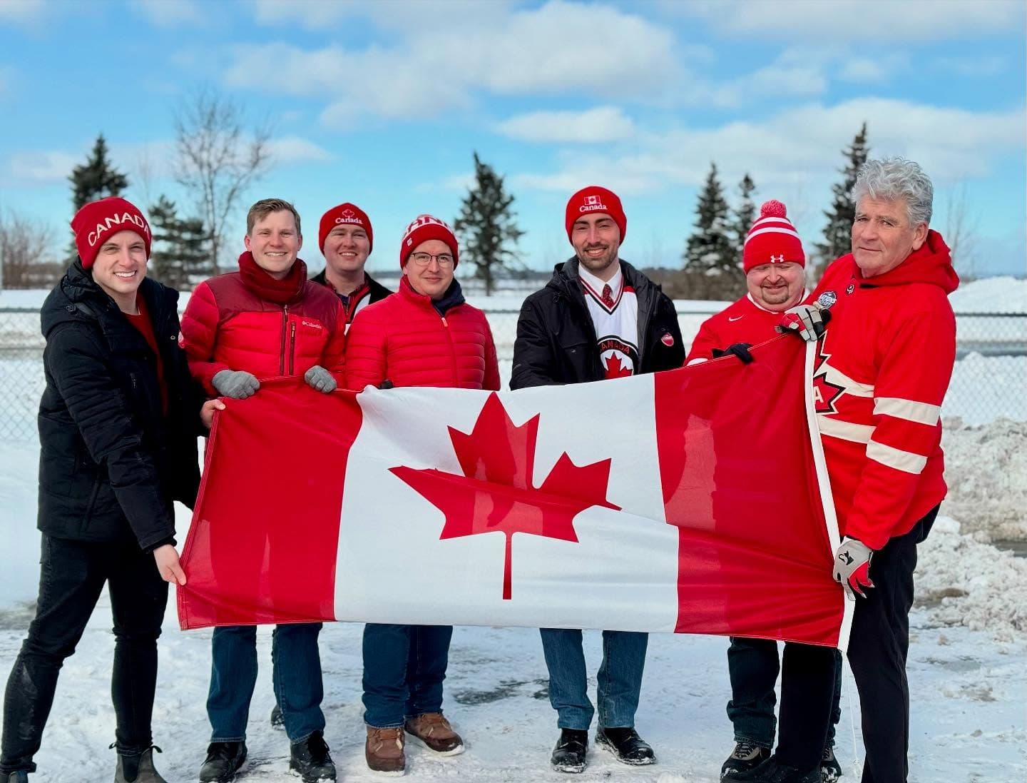 OLP Team Ottawa holding the Canadian flag