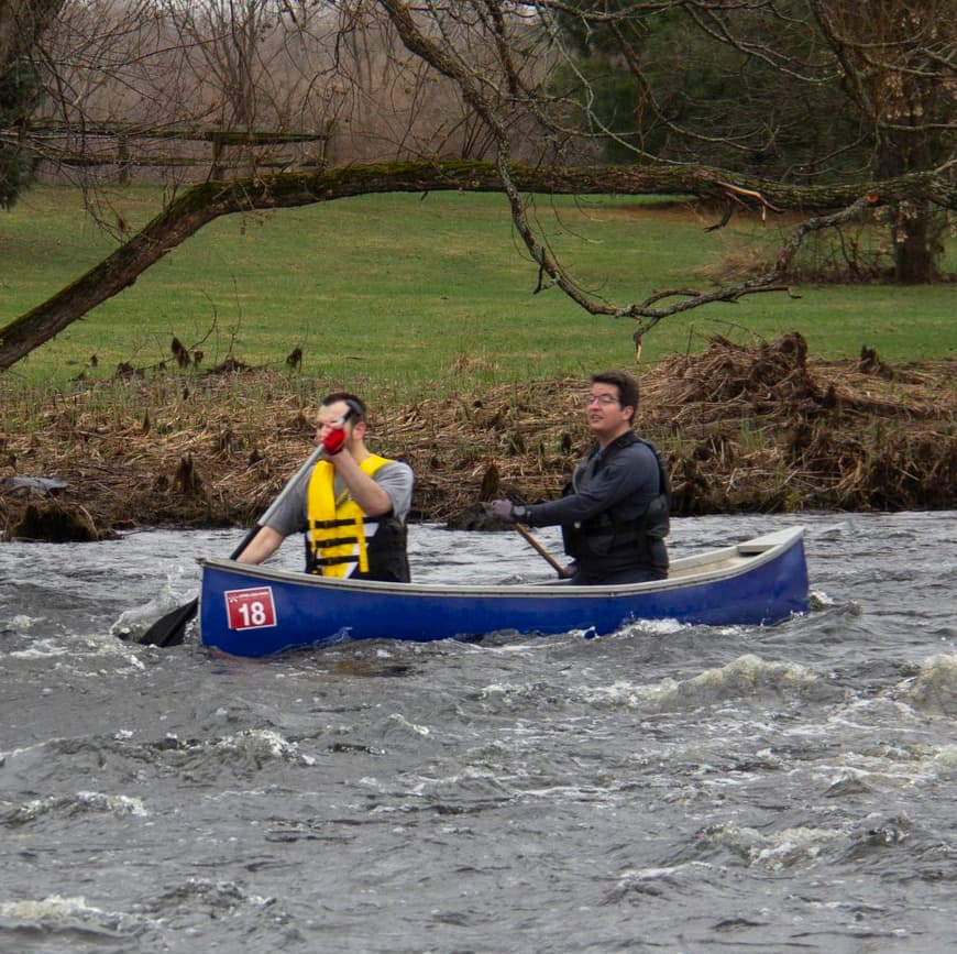 Paddling through some light rapids on the Jock River