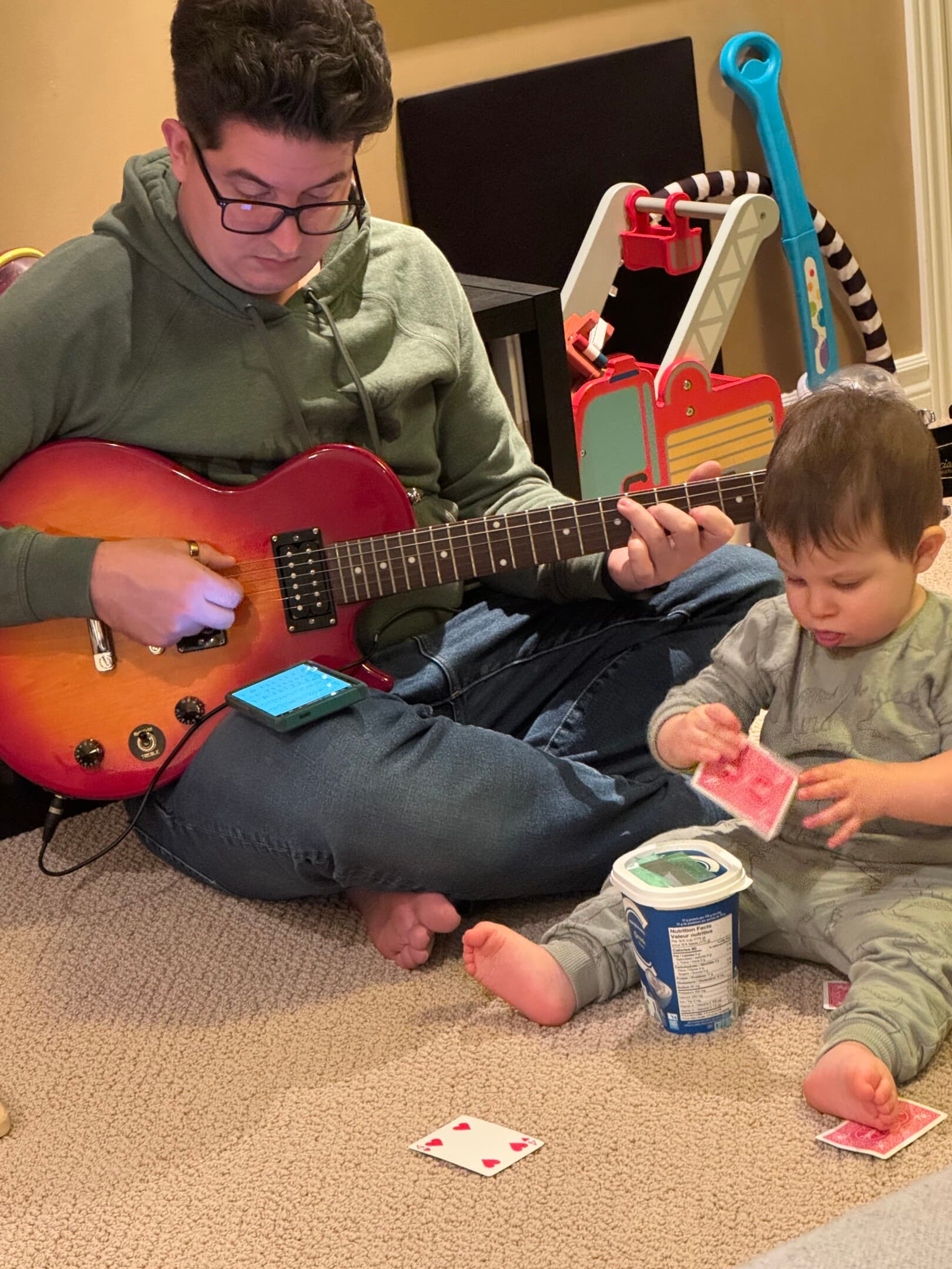 Playing guitar for Simon