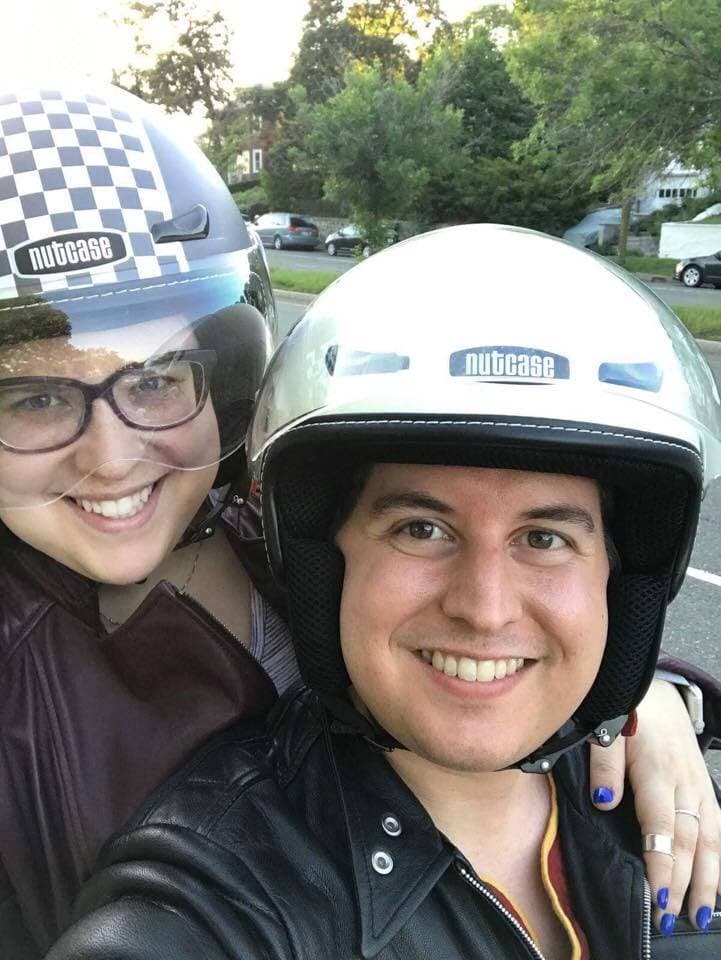 Brandon and his wife Rachel in motorcycle helmets